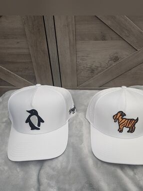 set of 2 new white Waggle Golf hats- the GOAT and the Wedge